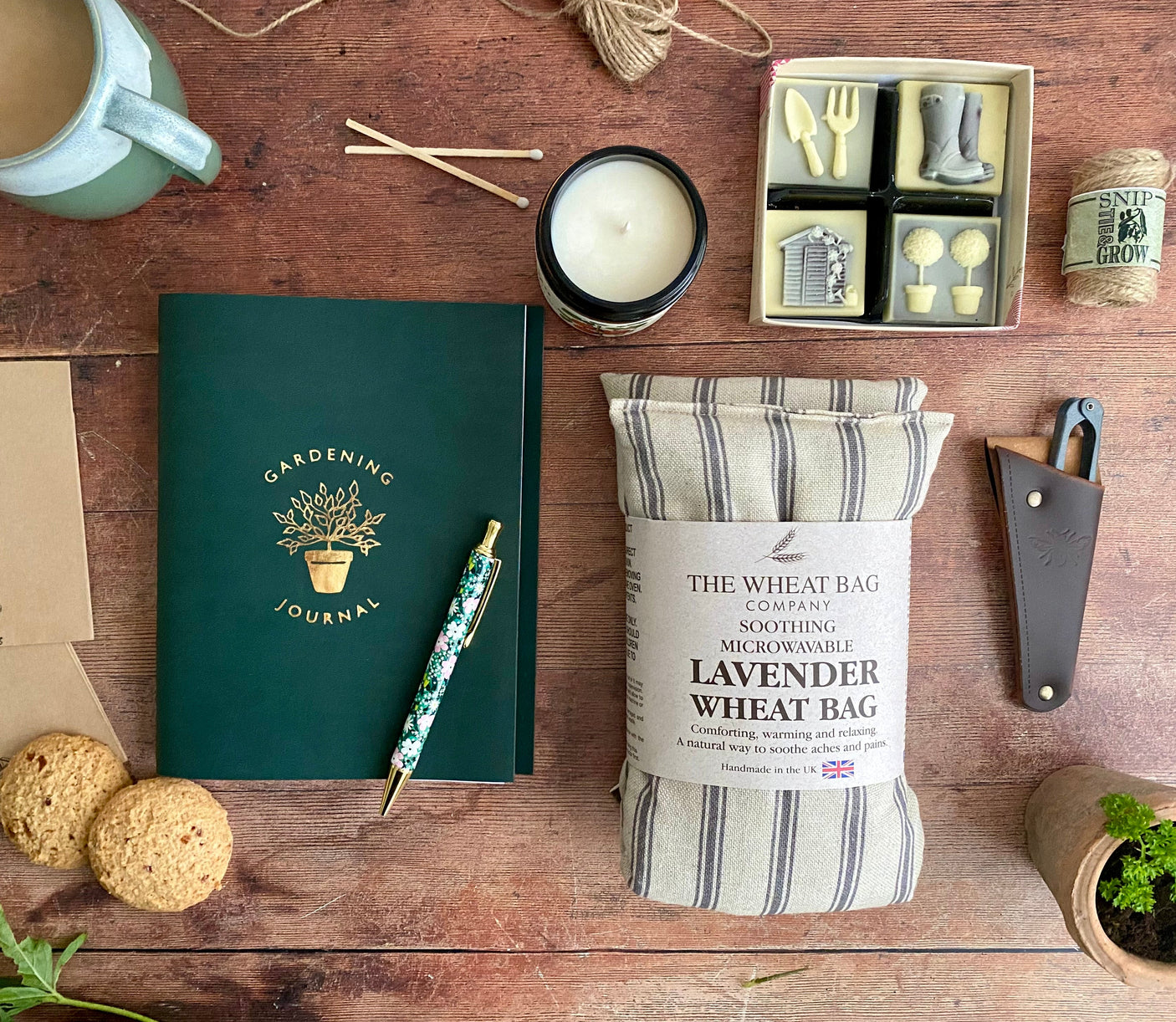 Garden Gift Hamper with Gardening Journal Planner, Lavender Wheatbag, Snips with Pouch, Seed Collecting Envelopes, Mini Twine, Solid Belgain Chocolate Garden Shapes, Tomato Leaf Scented Glass Jar Candle,